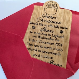 Personalised invitations to see Santa/Father Christmas in Lapland. Made from solid Oak and comes with a red envelope. Christmas experience