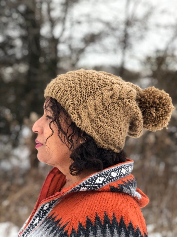 ball on top of winter hat