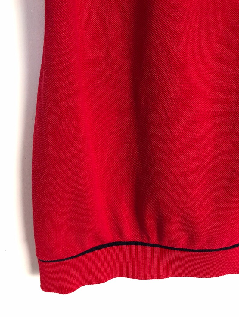 LACOSTE vintage red polo top with short sleeves and button down collar s 1990s
