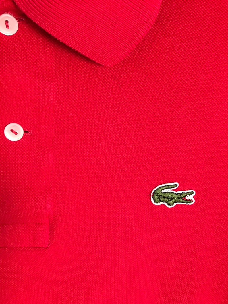 LACOSTE vintage red polo top with short sleeves and button down collar s 1990s