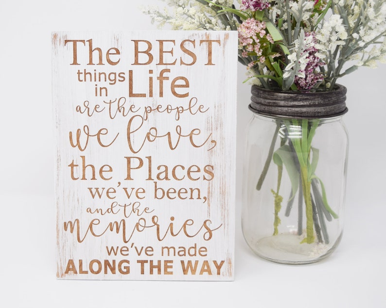 The best things in life are the people we love the places image 0