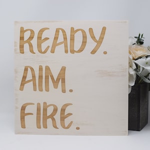 Ready. Aim. Fire. 7x7, 10x10 12x12, 15x15, 20x20, 25x25, 30x30 Engraved Wood Sign