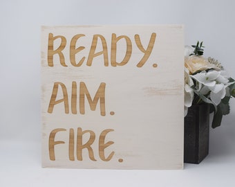 Ready. Aim. Fire. 7x7, 10x10 12x12, 15x15, 20x20, 25x25, 30x30 Engraved Wood Sign