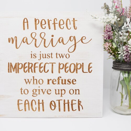 A Perfect Marriage Is Just Two Imperfect People Sign
