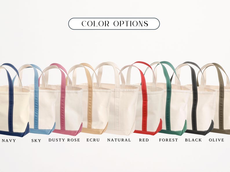 May include: A selection of canvas tote bags in colours such as navy, sky blue, dusty rose, ecru, natural, red, forest green, black, and olive. Each bag has contrasting trim and handles. The text "COLOR OPTIONS" is displayed above.