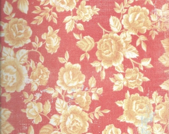 May include: A red background with a floral pattern featuring yellow roses and green leaves.