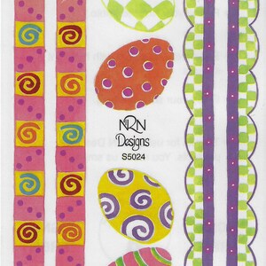 May include: A sheet of colorful Easter egg stickers with various patterns, including polka dots, stripes, swirls, and checkered designs. The stickers are arranged in rows and include two border strips with pink and yellow squares and swirls. The sheet also includes the text "NRN Designs S5024".