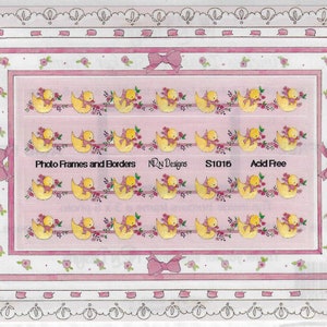 May include: A sheet of yellow duck border stickers with pink bows and flowers. The sheet is labeled "Photo Frames and Borders", "NRN Designs", "S1016", and "Acid Free".