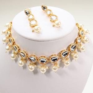 Simple Golden Pearl White Tear Drop Floral Indian Gold Jewelry Set | Earrings Set | Necklace Set | Modern Kundan Gold Plating