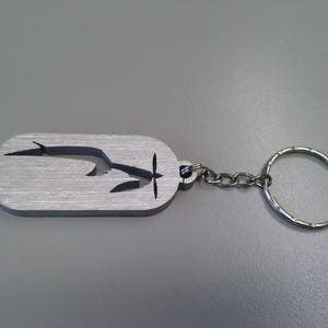 Airplane, flight, stylized Cessna, aeronautical keychain in aluminum