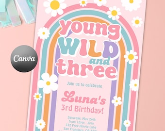 May include: A rectangular birthday invitation card with a light pink background featuring a colorful rainbow arch and white daisy flowers. The text reads: Young Wild and three, Join us to celebrate Luna's 3rd Birthday, Saturday, May 24th, 12pm-2pm, 532 Free Hippie Lane, San Francisco, CA 8221, RSVP to Janet at 520.111.1234.