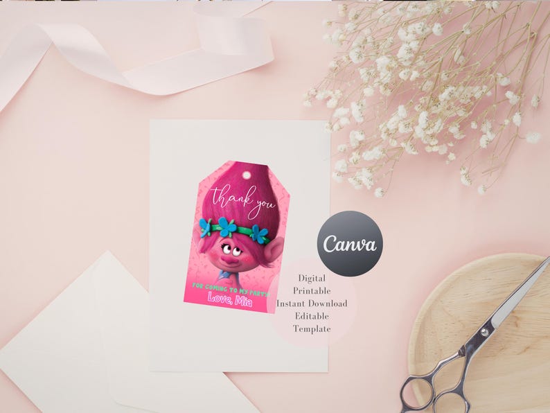 May include: A pink tag with a cartoon character and the words "thank you" in cursive. The tag also includes the text "For coming to my party, Love, Mia." The image is on a white card with a pink background.