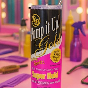 May include: A black and pink hair styling product bottle with the text "Pump it Up! Gold" and "Super Hold". The bottle has a silver straw and is 8 fl. oz. (237 mL).