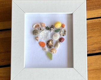 Beachcomb picture, picture of flotsam, shell picture, shell heart, heart of shells and snails, snail heart