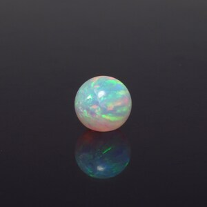 Gray Opal Sphere with free wood stand. Gray Opal Sphere with free wood stand.