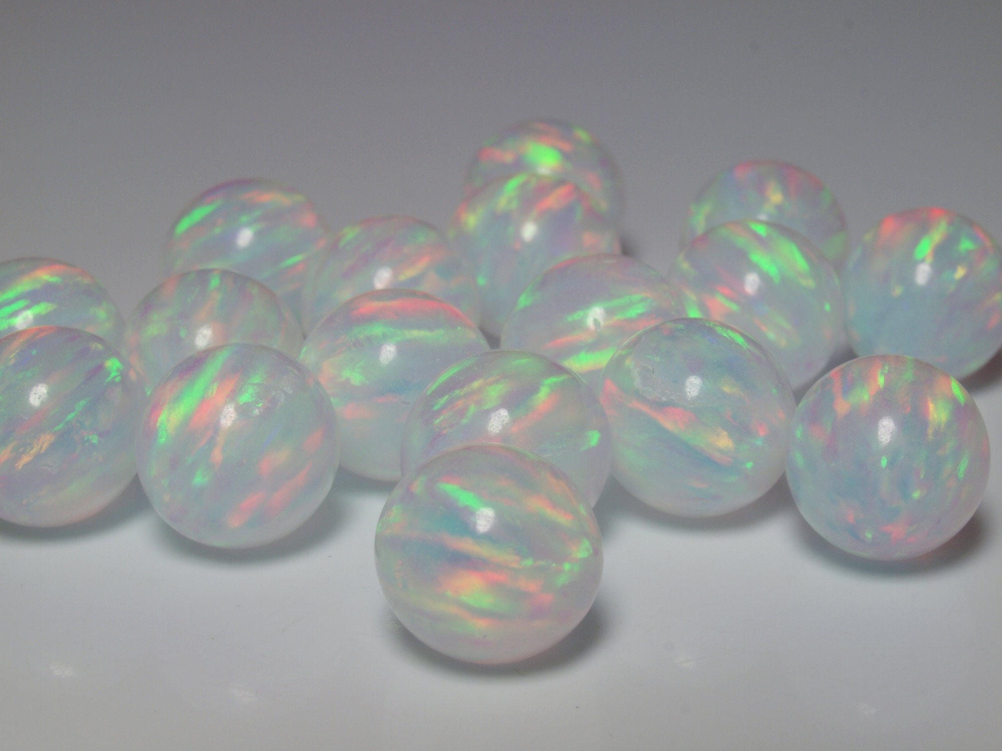 Gray Opal Sphere with free wood stand. Gray Opal Sphere with free wood stand.