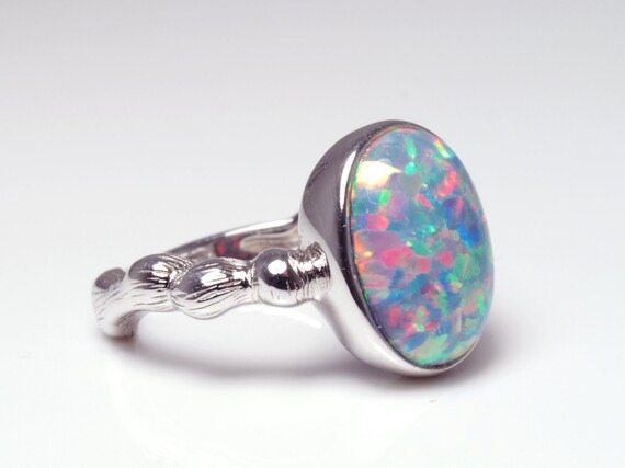 Man made opal online rings