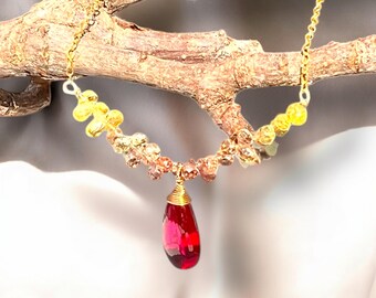 ルビーとオレンジサファイアのゴールドネックレス • アーティスト