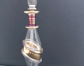 Beautiful Egyptian blown, hand painted perfume bottle.
