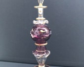 Beautiful Egyptian blown, hand painted perfume bottle.