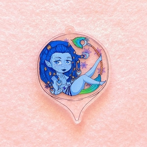 May include: A blue and green character with long blue hair and a braid is sitting on a swing. The character is wearing a blue and white outfit. The background is a white and blue snowflake pattern.