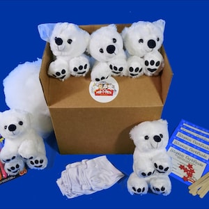 May include: A set of white polar bear plush toys in a cardboard box with a white fluffy material, markers, and adoption certificates. The box has a logo that says "My-Pet-Pets".