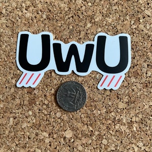 May include: A white sticker with the word "UWU" in black letters. The sticker has red lines on either side.