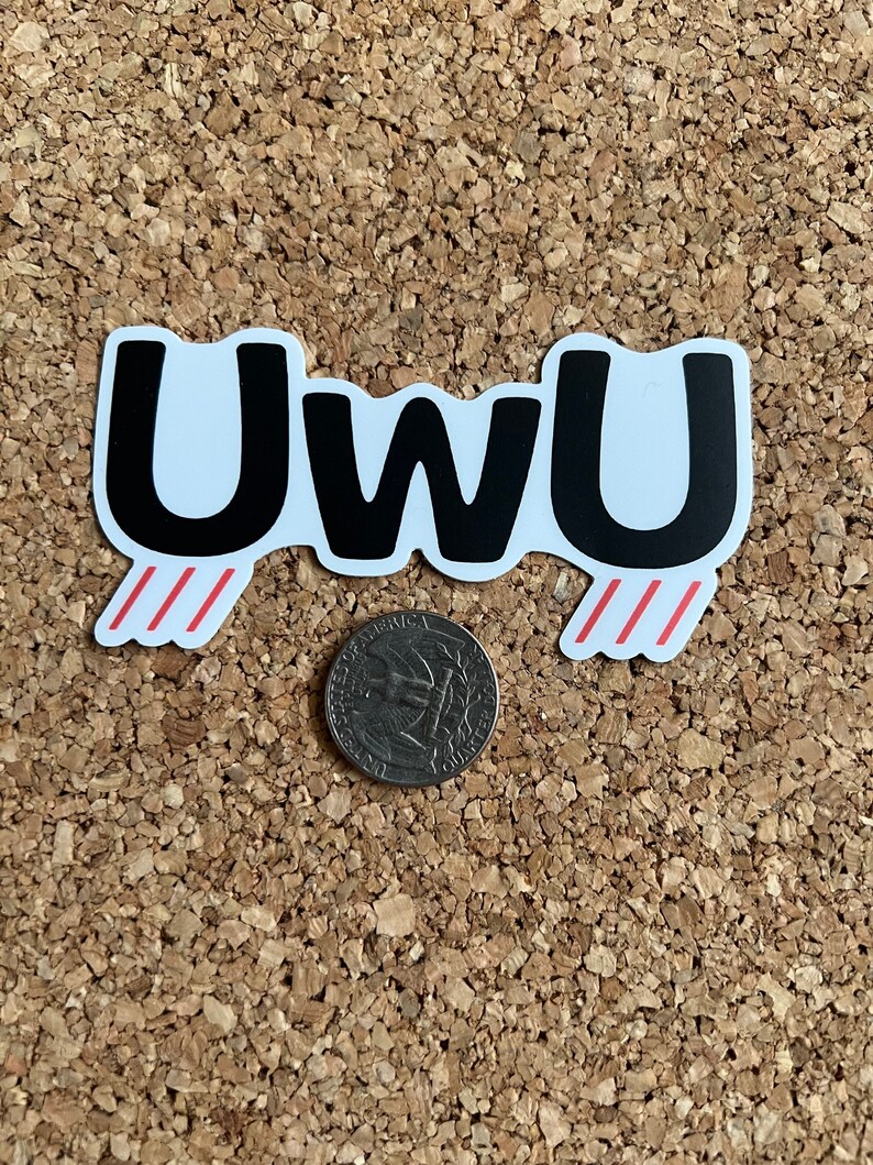 May include: A white sticker with the word "UWU" in black letters. The sticker has red lines on either side.