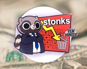 May include: A red and yellow enamel pin featuring a cartoon raccoon wearing a blue suit and tie, standing in front of a red chart with the word "stonks" and a downward yellow arrow. The chart shows a series of numbers, including 0.53699, 1.41, and 1.06. The pin also includes a small trash can icon.