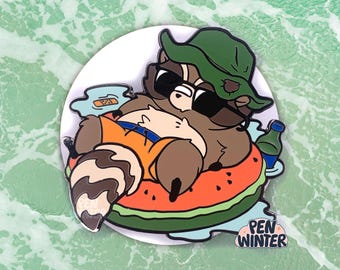 May include: A raccoon wearing a green hat and sunglasses is relaxing in a watermelon-shaped pool float. The raccoon is wearing a bright orange life vest. The float is surrounded by water and there is a blue and white striped beach towel in the background. The text "PEN WINTER" is visible in the lower right corner of the image.