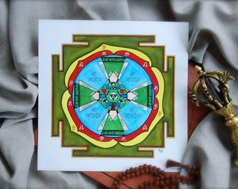 May include: A colourful mandala with a green, blue, red and yellow colour scheme. The mandala features the Sanskrit word "Om" and the phrase "Shri Varahideva" repeated four times. The mandala is surrounded by a square frame with a green background.