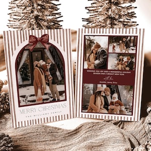 May include: Two rectangular holiday cards with a vertical striped pattern in white and muted brown. The left card features an arched photo frame with a red bow, text reading MERRY CHRISTMAS THE WILLIAMS FAMILY. The right card displays multiple photos and text: WISHING YOU JOY AND A WONDERFUL HOLIDAY SEASON AND A BRIGHT NEW YEAR, with love, Jennifer, Jenny, Erica.