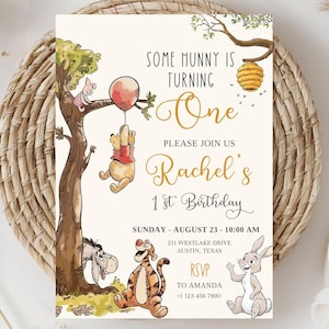 May include: A birthday invitation featuring Winnie the Pooh characters. The invitation includes the text "SOME HUNNY IS TURNING ONE" and details for a first birthday party, including the date, time, and location.