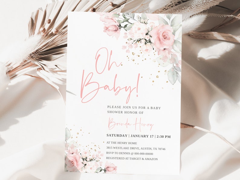 May include: A pink and white floral baby shower invitation with gold glitter accents. The invitation reads "Oh Baby!" and includes the date, time, and location of the shower. It also includes the name of the honoree, Brenda Henry, and the RSVP information.