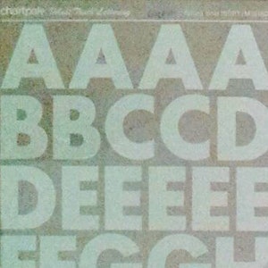 May include: White alphabet stickers on a brown background. The stickers are arranged in three rows, with each row containing a different set of letters. The letters are in uppercase and are all the same size. The stickers are perfect for adding a personal touch to any project.