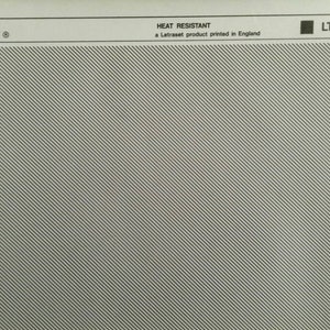 May include: A white sheet of paper with a black and white diagonal line pattern. The text "HEAT RESISTANT" and "a Letraset product printed in England" is printed in black at the top of the page. The text "LT 924" is printed in black in a black rectangle at the top right corner of the page.