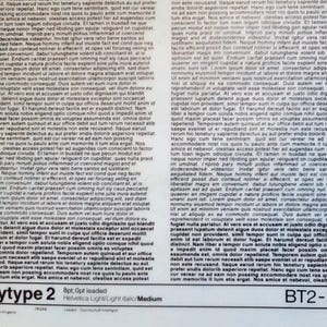 May include: A printed page with dense text, featuring the words "Bodytype 2" and "BT2-2800" at the bottom. The text is in a serif font, with a light/italic style. The page is white.