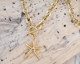 Collar de cadena gruesa de acero chapado en oro con colgante de estrella de mar. Cierre de barra en T. Collar con cierre de palanca. Regalo de Navidad para mujer o niña.