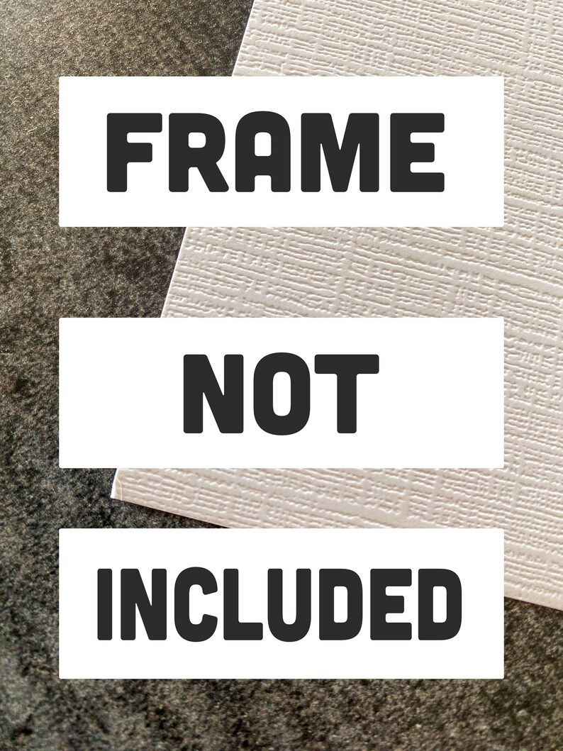 May include: White rectangular sign with black text that reads "FRAME NOT INCLUDED".