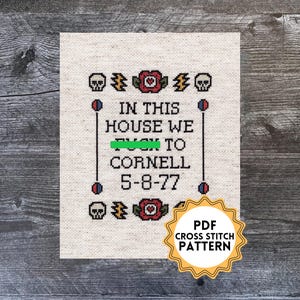 May include: A cross stitch pattern PDF for a design that says "In this house we listen to Cornell 5-8-77". The design features skulls, flowers, and lightning bolts.
