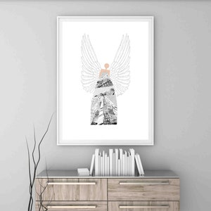 May include: A black and white illustration of an angel with wings. The angel is wearing a dress made of different patterns. The illustration is framed and hanging on a wall above a wooden dresser.