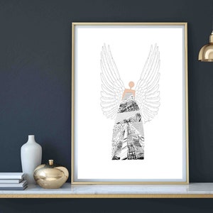 May include: A framed print of a black and white illustration of an angel with wings. The angel is wearing a dress made of a collage of different patterns. The background is white.