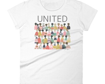 May include: White t-shirt with a graphic of a crowd of people in various colors and the word "UNITED" printed in black above the graphic.