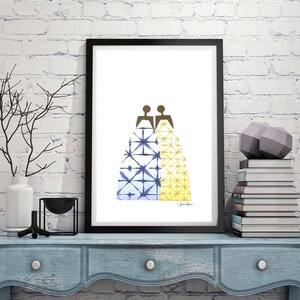 May include: A framed print of two figures in blue and yellow patterned dresses, standing back to back. The print is on a white background and has the artist's signature in the bottom right corner.