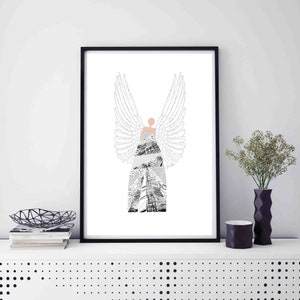 May include: Black and white print of an angel with wings, wearing a patterned dress. The print is framed in a black frame and is hanging on a white wall.