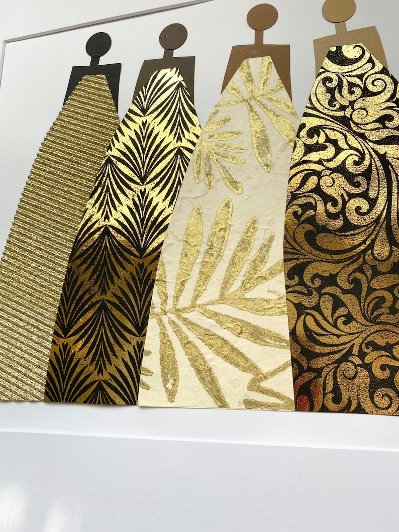 May include: Four abstract figures with black silhouettes and gold patterned dresses. The dresses feature different patterns, including stripes, leaves, and swirls.