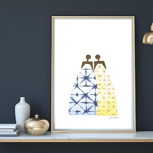 May include: A framed print of two figures in blue and yellow patterned dresses. The print is on a white background and has the artist's signature in the bottom right corner.