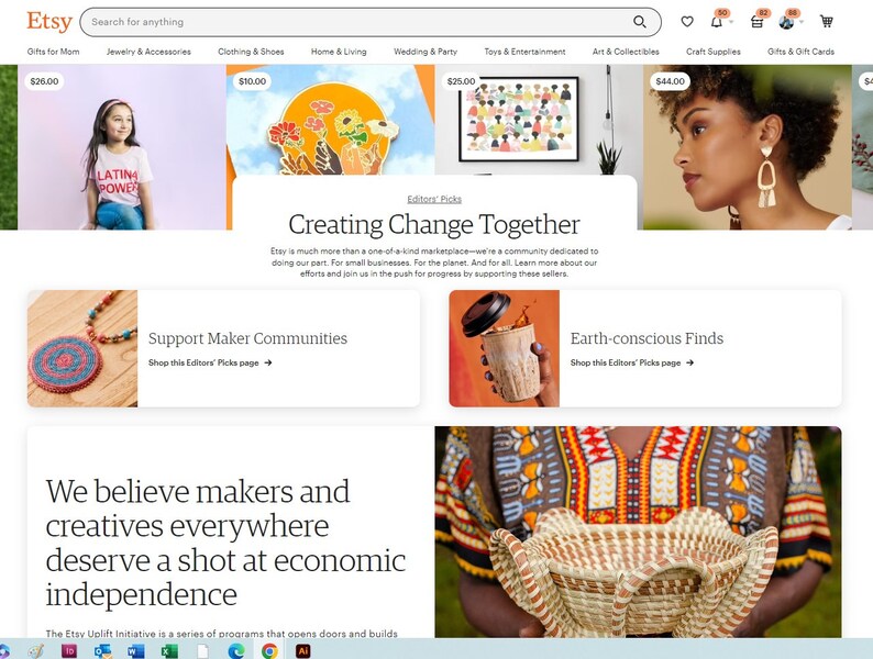 May include: Etsy website homepage with the text "Creating Change Together" and a call to action to support maker communities and earth-conscious finds. The text "We believe makers and creatives everywhere deserve a shot at economic independence" is displayed below the call to action.