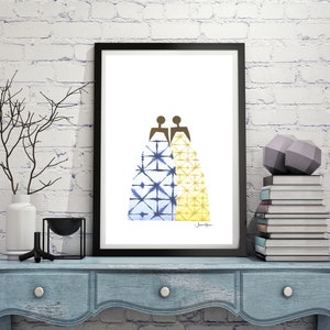May include: A framed print of two figures in blue and yellow patterned dresses, standing back to back. The print is on a white background and has the artist's signature in the bottom right corner.