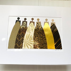 May include: A framed collage of seven figures in black silhouettes wearing gold and black patterned dresses. The dresses are made of different materials, including textured paper, metallic foil, and fabric.
